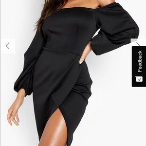 Mini black off the shoulder black dress. Fits a medium/large. Super comfortable